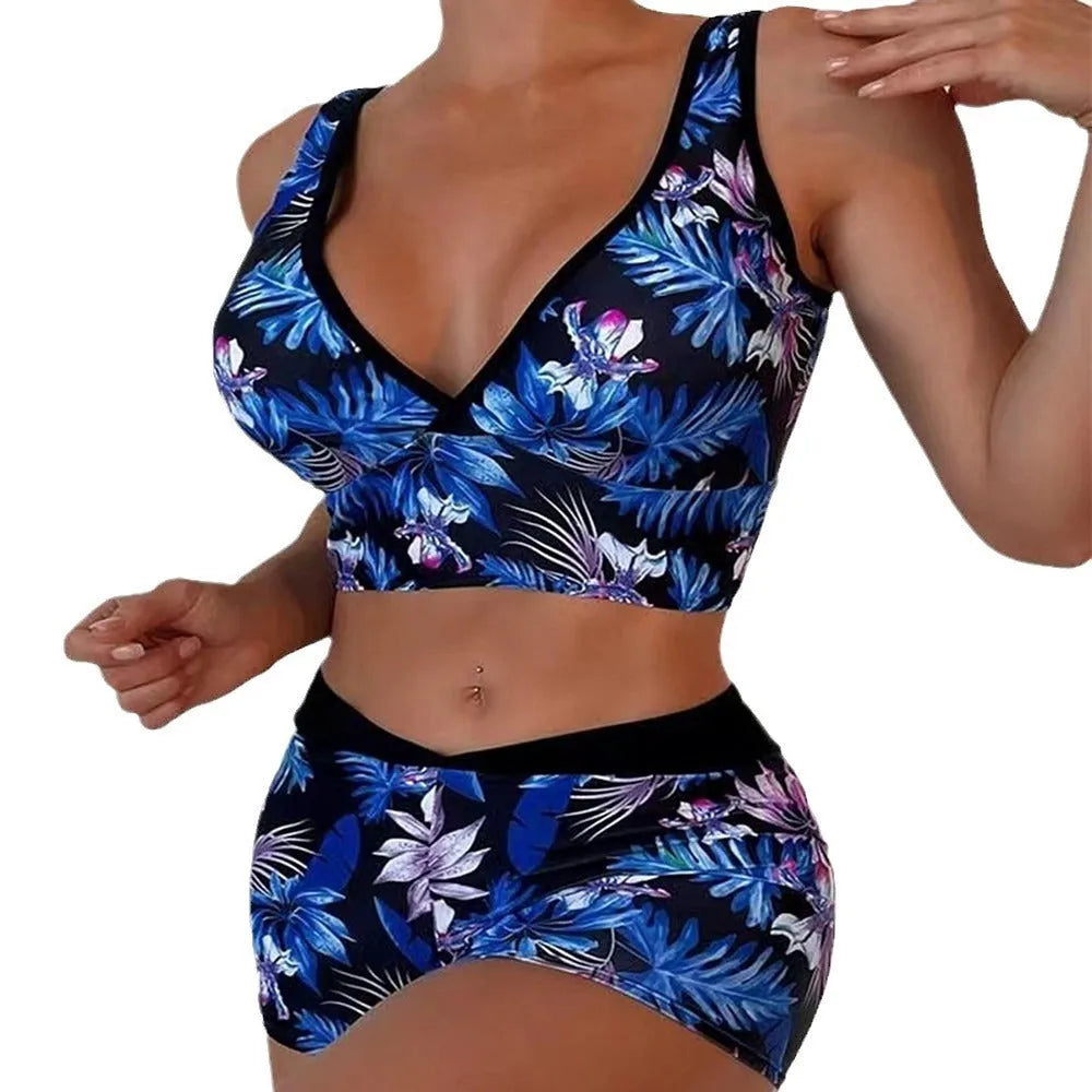 Women's two-piece swimsuit set with printed boxer briefs and sleeveless top in a multi-colour pattern.