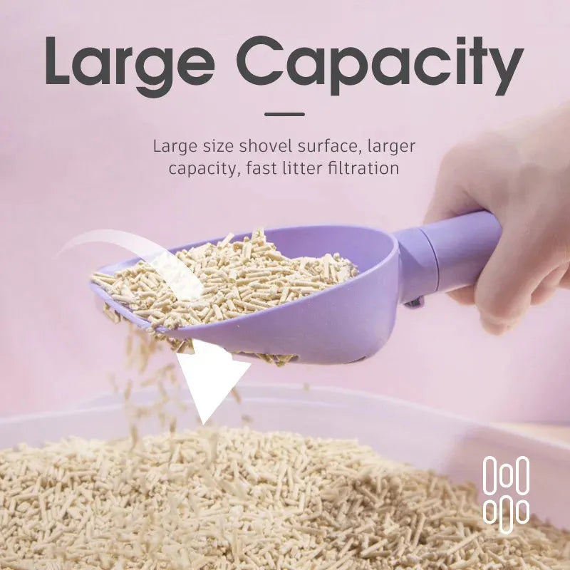Plastic cat litter scoop with base in white model, showing hidden bag storage compartment and large scoop head with alternating apertures
