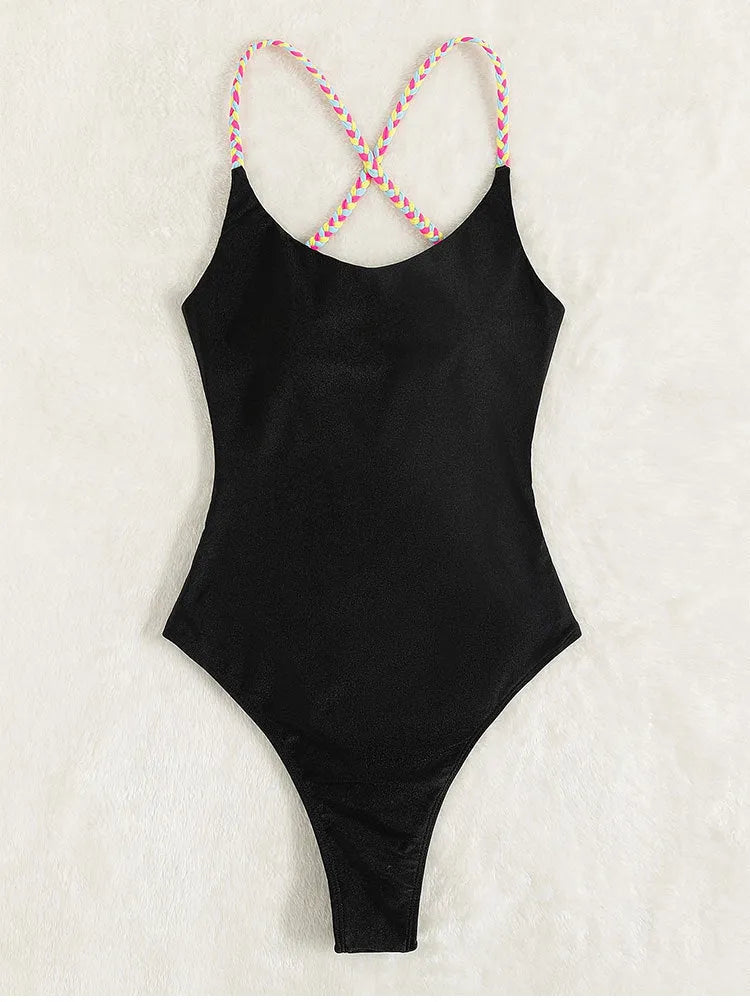 Women's one-piece solid colour backless nylon swimsuit in black, front view