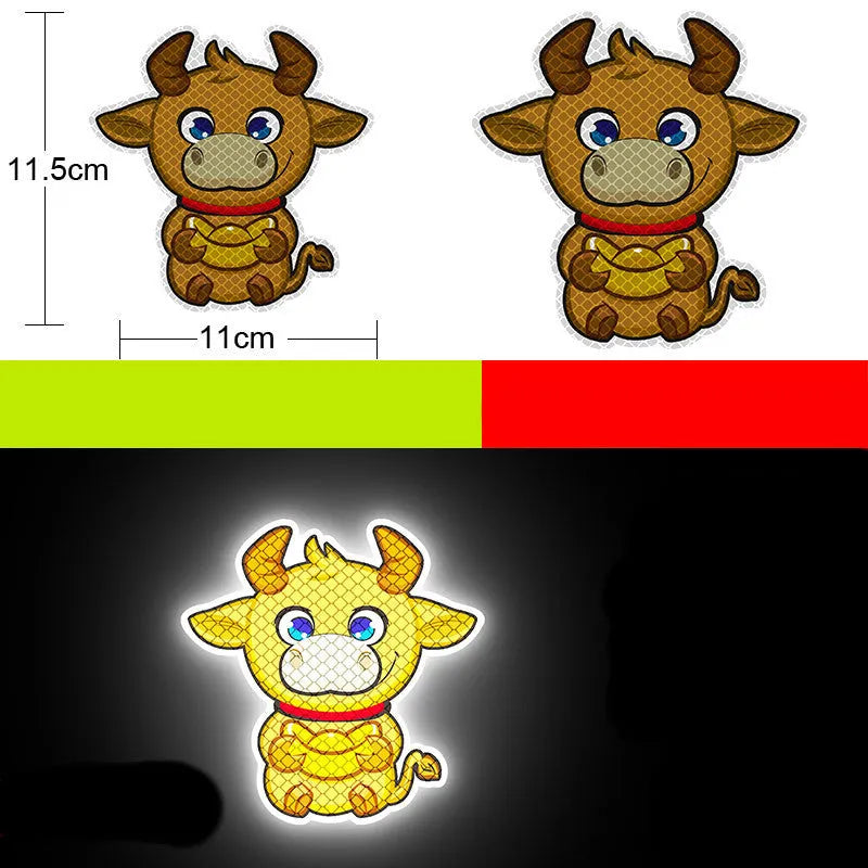 Pair of diamond-grade reflective warning stickers for cars and motorcycles, showing sample cartoon animal designs.