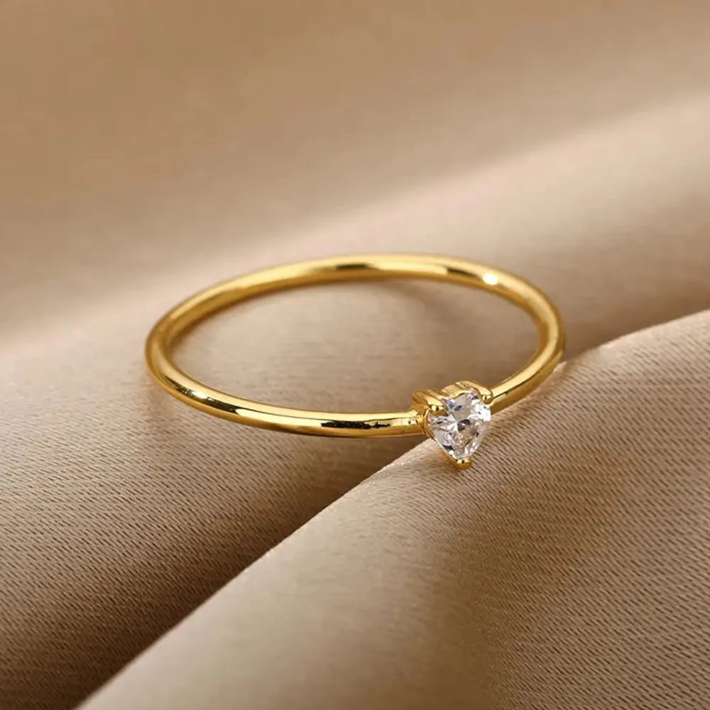 Women's 18K gold plated copper geometric heart zircon stacked ring, size No 7, on finger