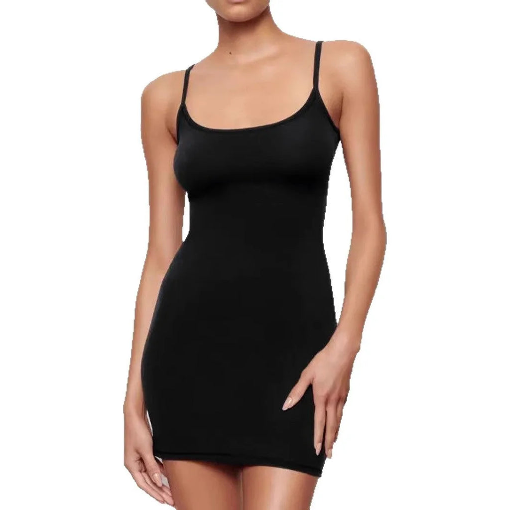 Black sling style sheath dress with skinny silhouette and short skirt length