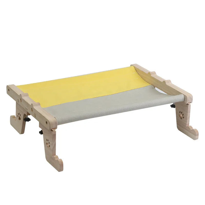 Wooden frame cat hanging bed with patterned removable cushion mounted on window