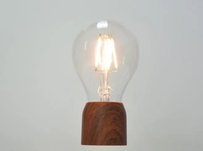 Magnetic levitation floating bulb lamp with imitation wood base