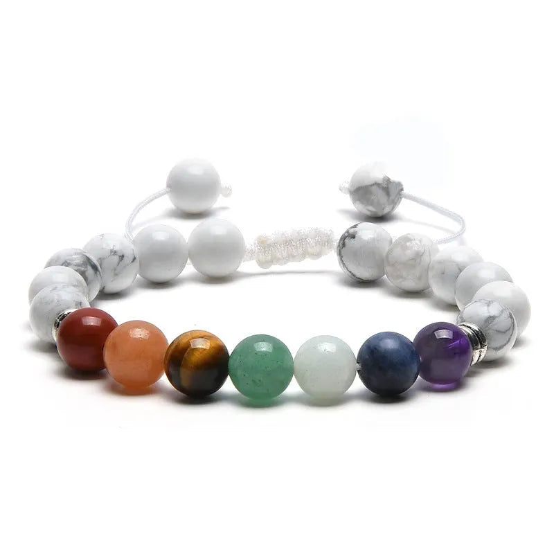 Women's flat knot braided healing bracelet with natural aquamarine stone, hand-woven geometric design on white background