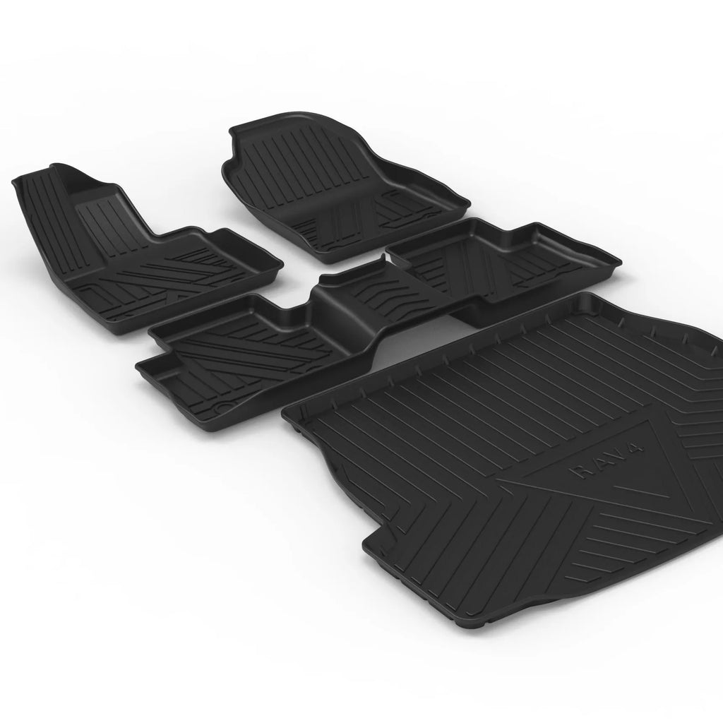 Black carbon fibre pattern TPE boot liner for a Special Car, showing textured surface and custom fit.