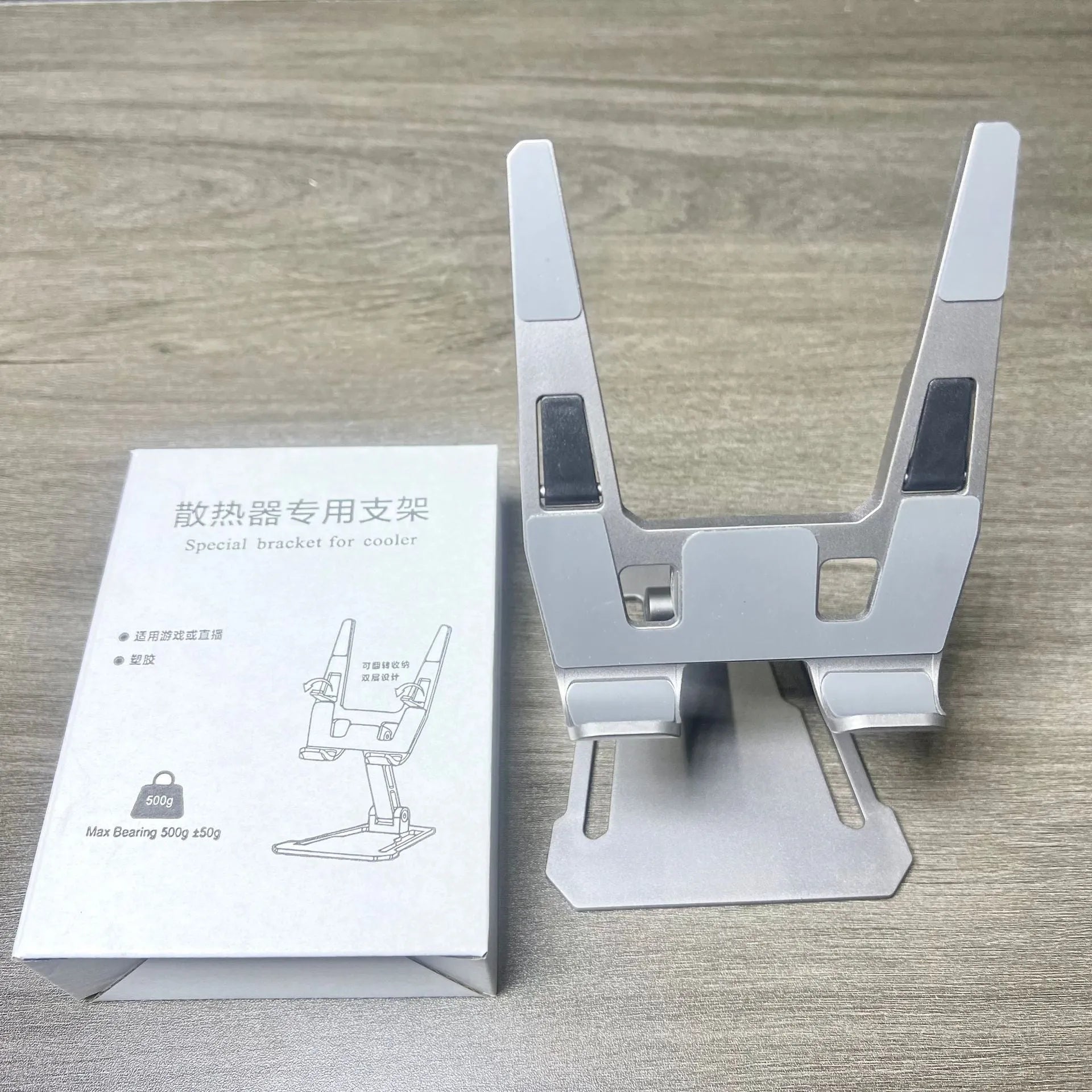 Creative desktop phone holder in aluminium alloy with radiator bracket, FZ01 style, on a desk