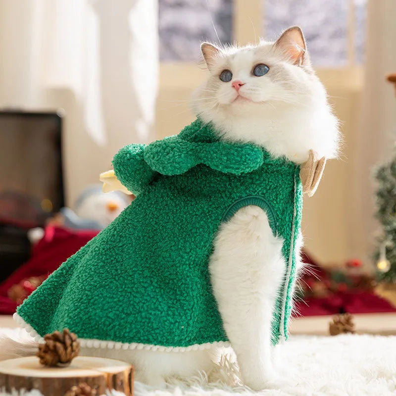 Cat wearing warm thickened elk cloak in polyester with drawable closure, available in brown or green elk pattern