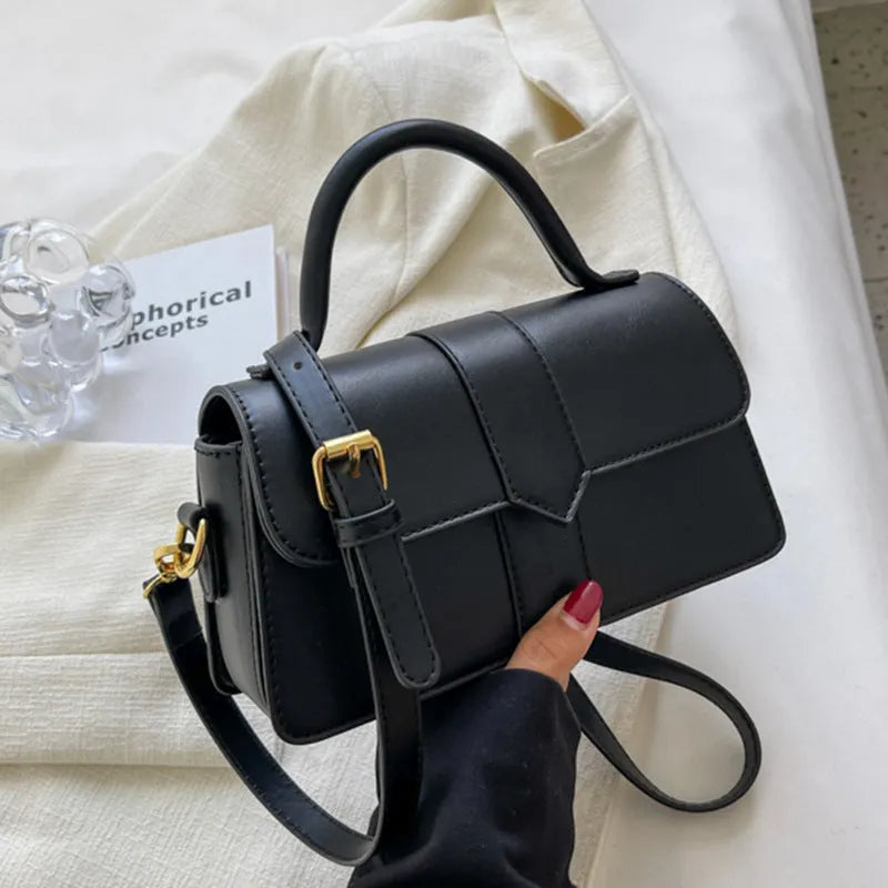 Women's beige PU messenger bag showing internal file organisation and sandwich pocket exterior
