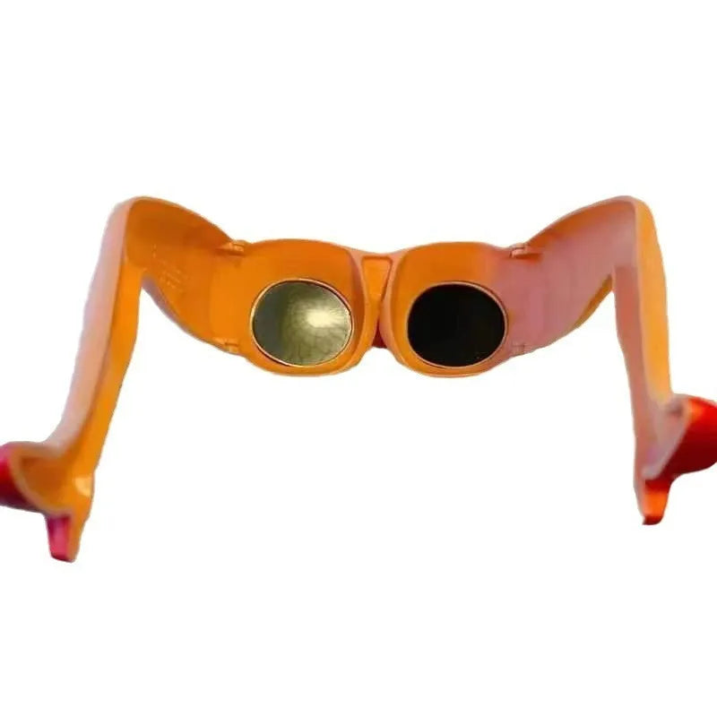 Orange plastic novelty sunglasses featuring a leg and hip design theme.