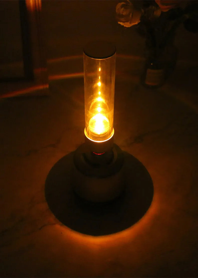 White silver cylindrical Bluetooth speaker with candlelight night light measuring 277mm tall