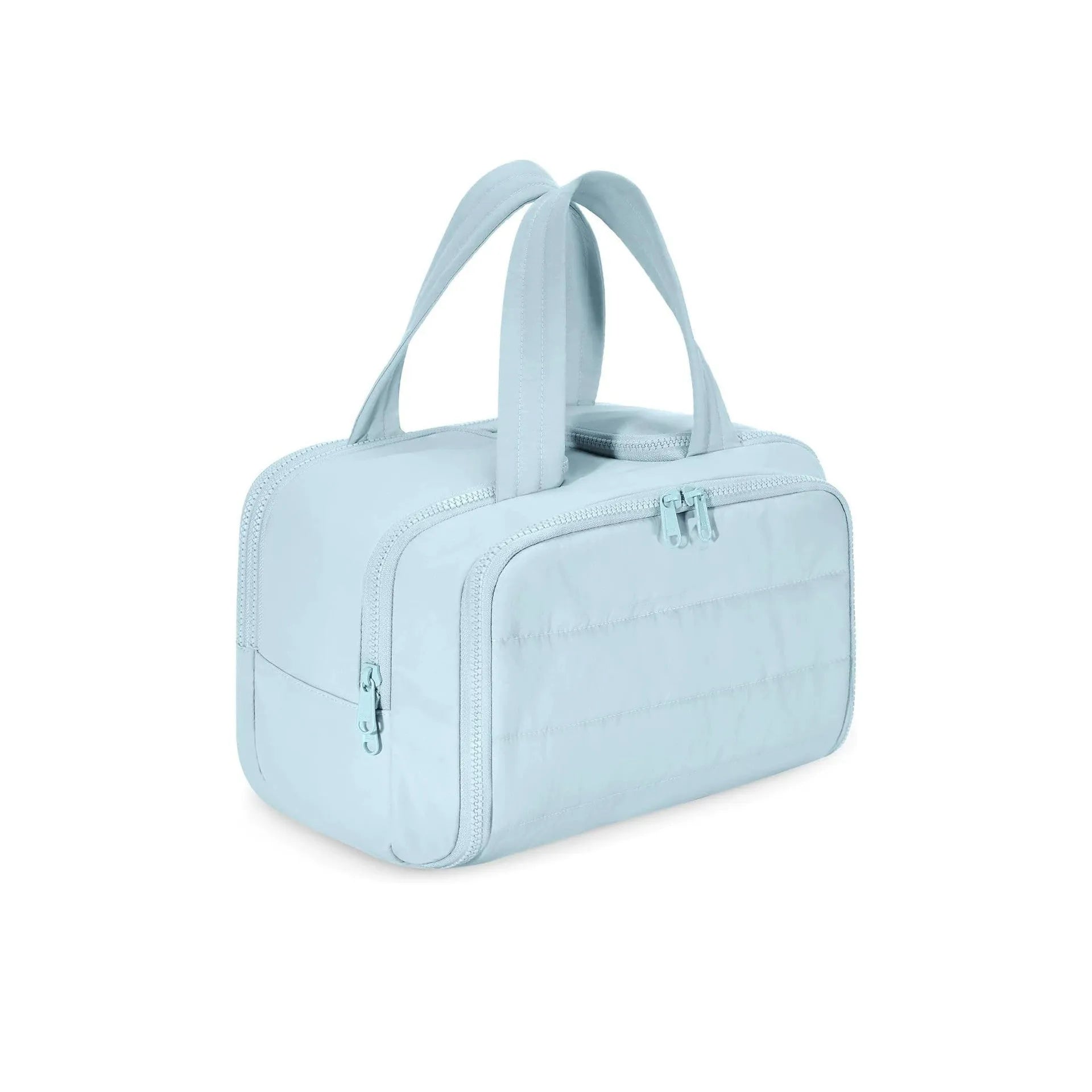 Large lightweight polyester travel toiletry bag with wide opening in beige colour on a neutral background.