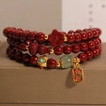 Multi-circle cinnabar bracelet with gourd and five petal flower motifs, polished finish, 6mm beads