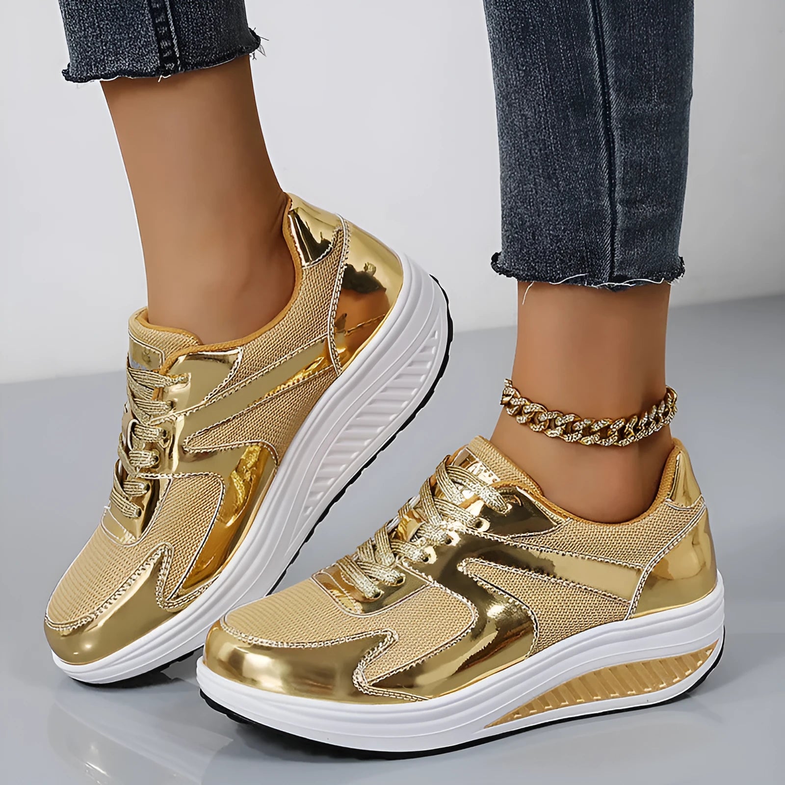 Women's gold mesh platform elevator trainers with cross strap and round toe