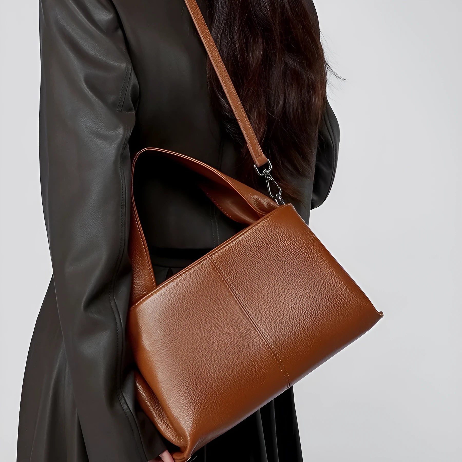 Women's cowhide messenger bag with retro texture in horizontal square shape showing double shoulder straps