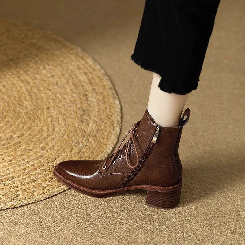 Women's black pointed toe ankle boots with short tube design and block heel