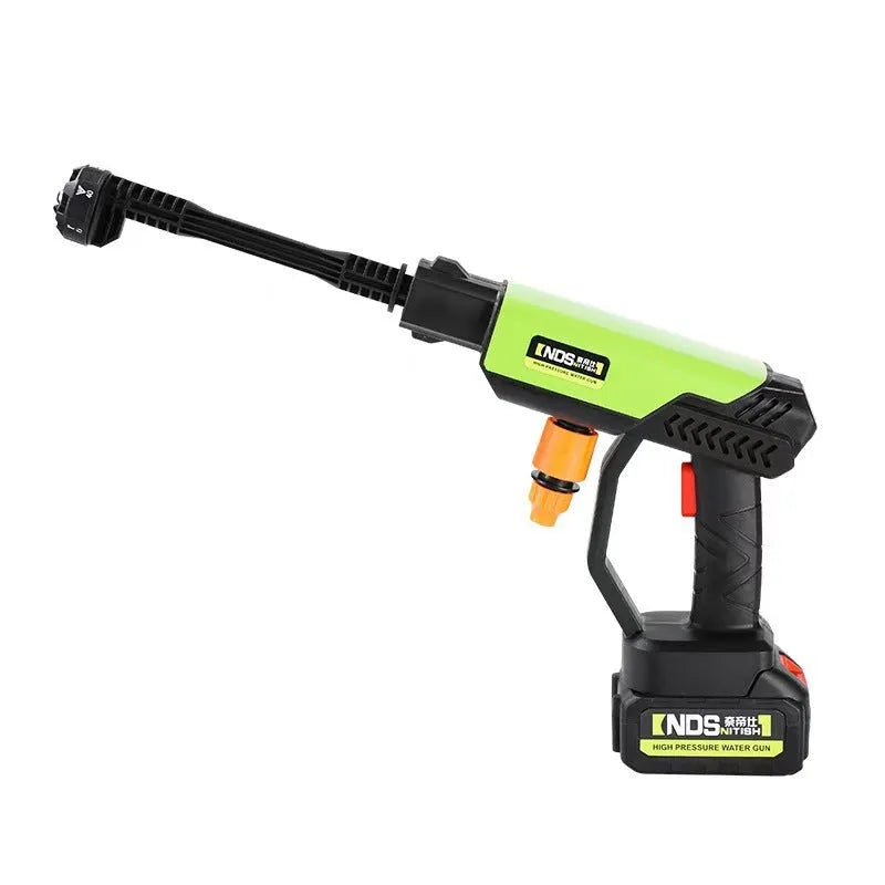 Green wireless high-pressure water gun with multiple nozzle attachments and accessories on a white background.