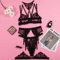 Black women's bikini set with embroidery detail on a mesh bra and matching briefs.