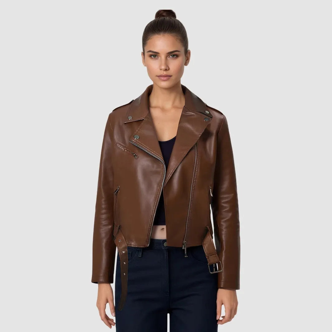 Women's black PU leather motorcycle jacket with lapel collar and adjustable waist belt on a hanger.