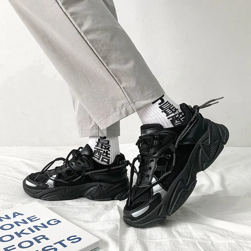 Men's black Korean style platform sports shoes with lace-up front and mesh lining.