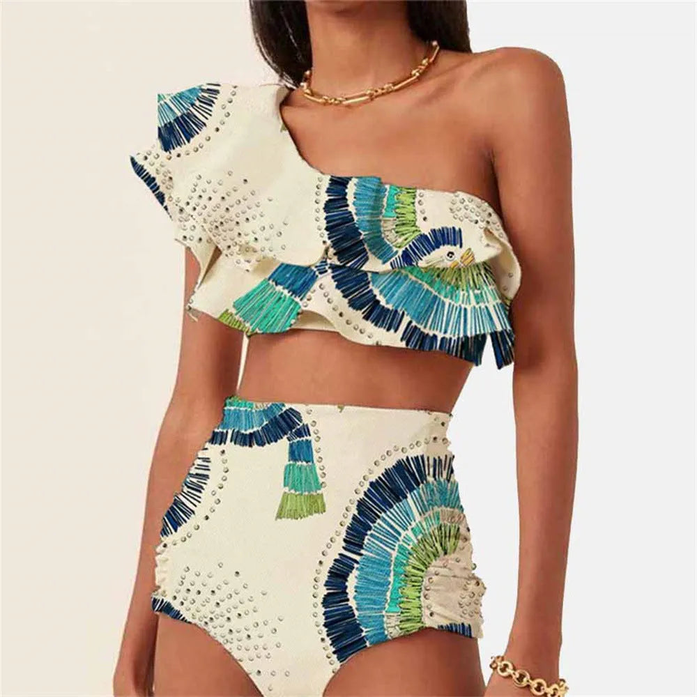 White women's one-shoulder swimsuit with large lotus leaf design and split bikini bottom