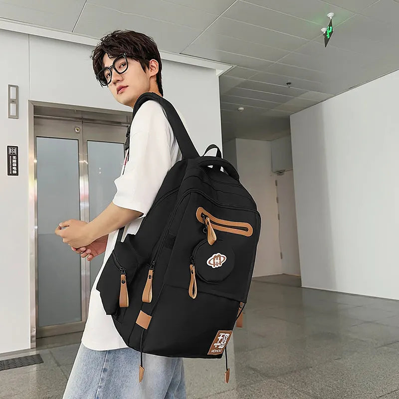 Japanese large capacity leisure travel backpack in black nylon with contrast stitching and waterproof finish