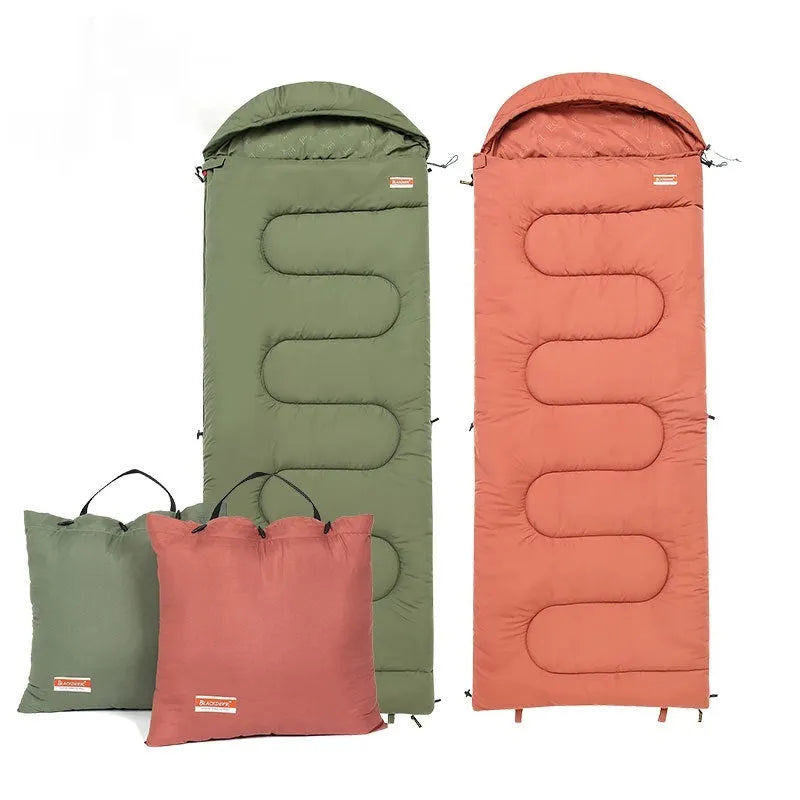 Rectangular ochre cotton sleeping bag quilt laid out flat for camping.