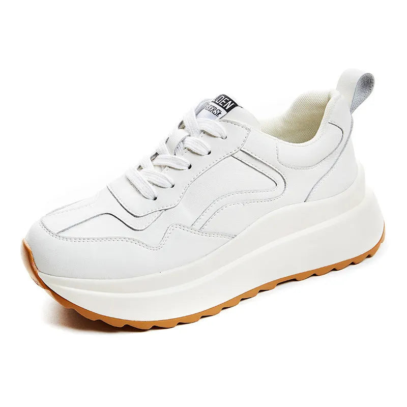 Beige women's low-top leather casual shoes with cross strap and English muffin heel on a white background.