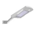 Solar mini outdoor rainproof garden light with 48 LED human body induction in black wall mount style on a brick wall