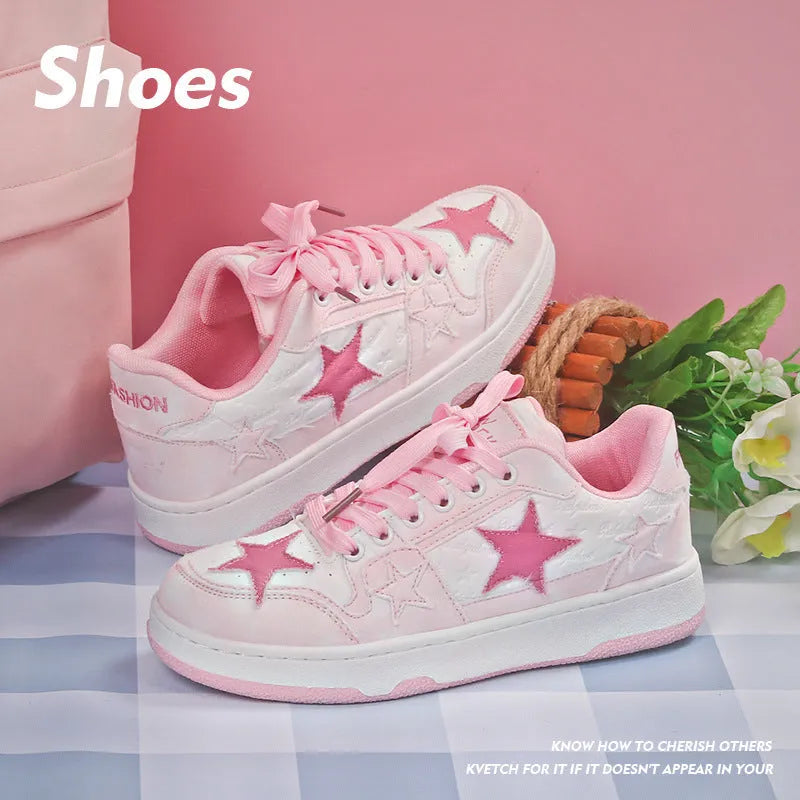 Denim skateboard shoes with round toe, rubber sole and front lace-up in pink, green and black colours