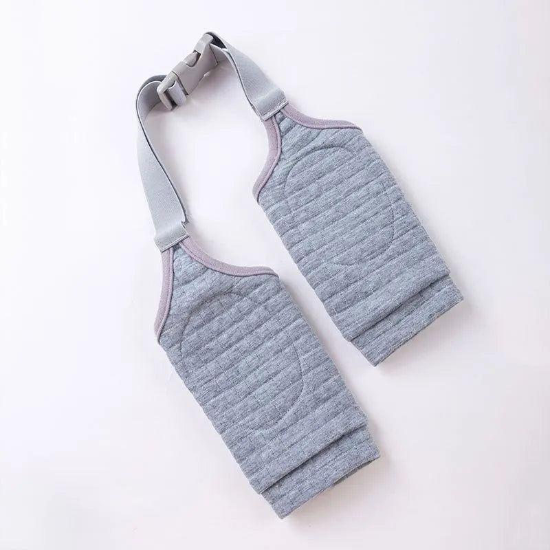Blue dog knee protector with matching scarf showing adjustable straps and elbow padding