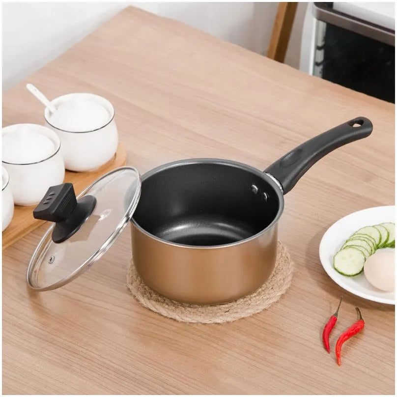 Three-piece cast iron non-stick cookware set with soup pot milk pot and wok in light luxury style