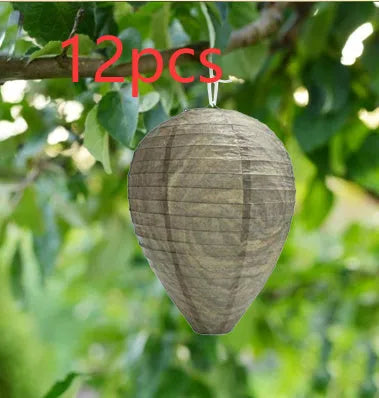 Hexagonal paper beehive lantern with wire frame, shown in photo colour.