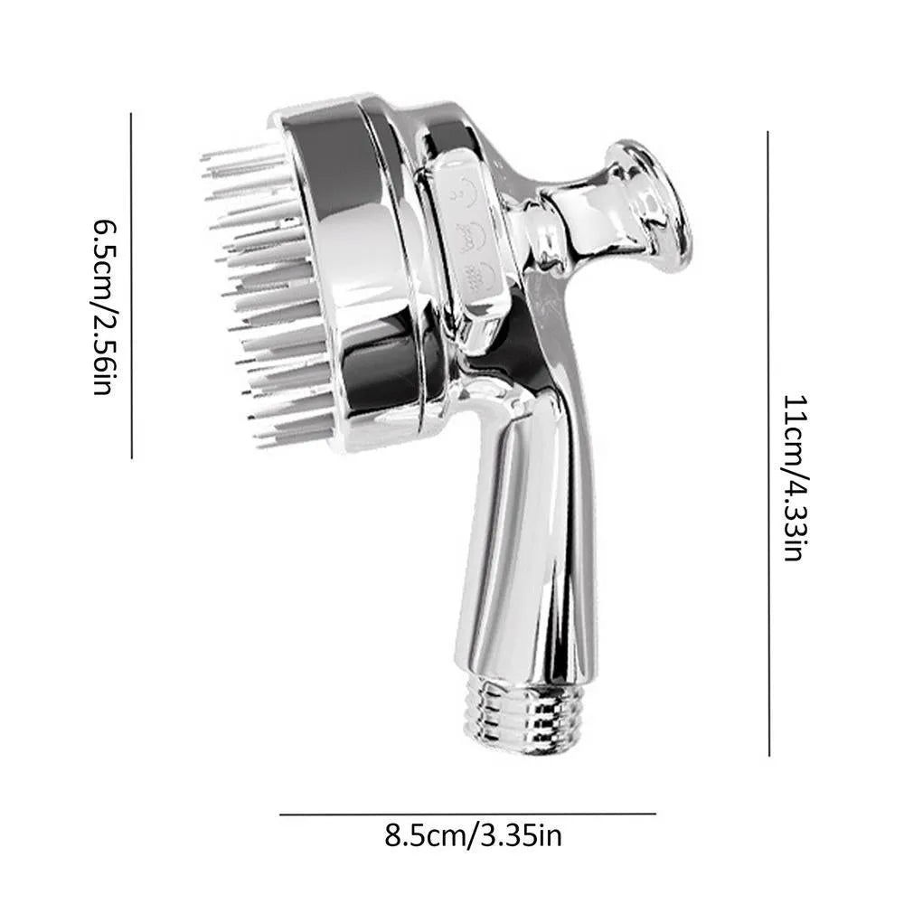 Silver dog shower attachment with soft silicone comb teeth and ergonomic grip on a white background