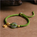 Hand-woven green rope bracelet with a Hetian jade safety buckle, adjustable sliding knot, women's National style accessory