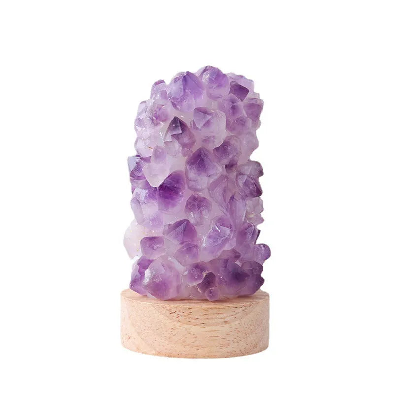Mini amethyst tooth flower night light with USB plug-in showing purple crystal and warm glow