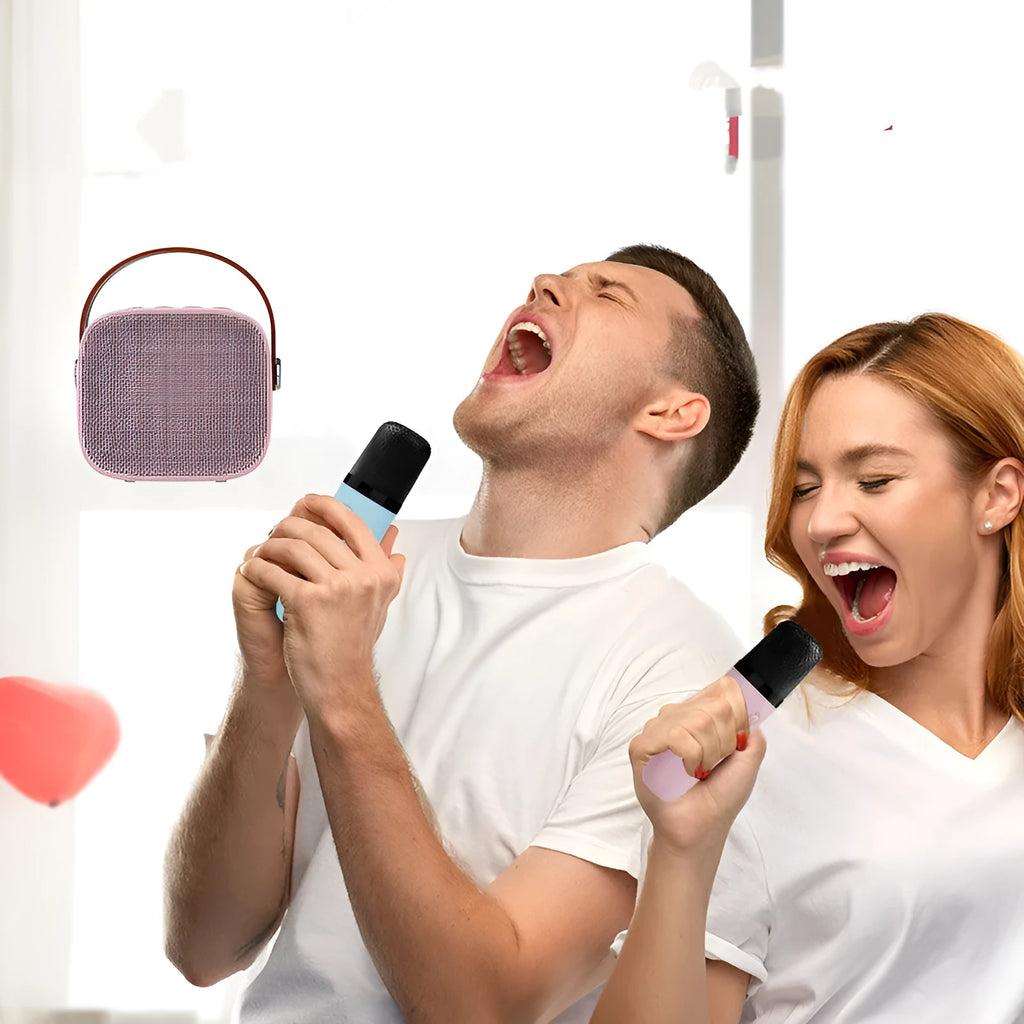 Wireless Bluetooth portable speaker with microphone in plastic shell, available in white pink and blue, with USB charging