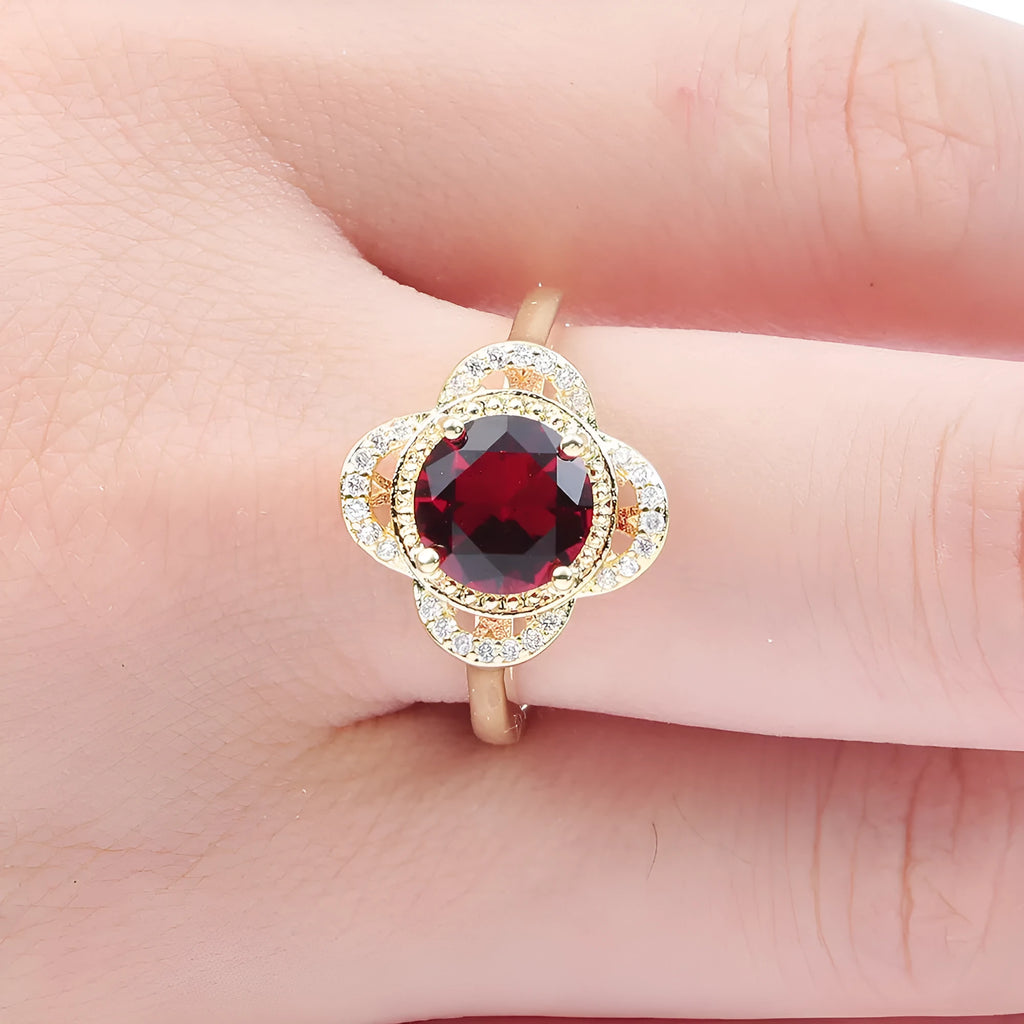 Copper fruit-shaped zircon ring for men and women on a plain background.
