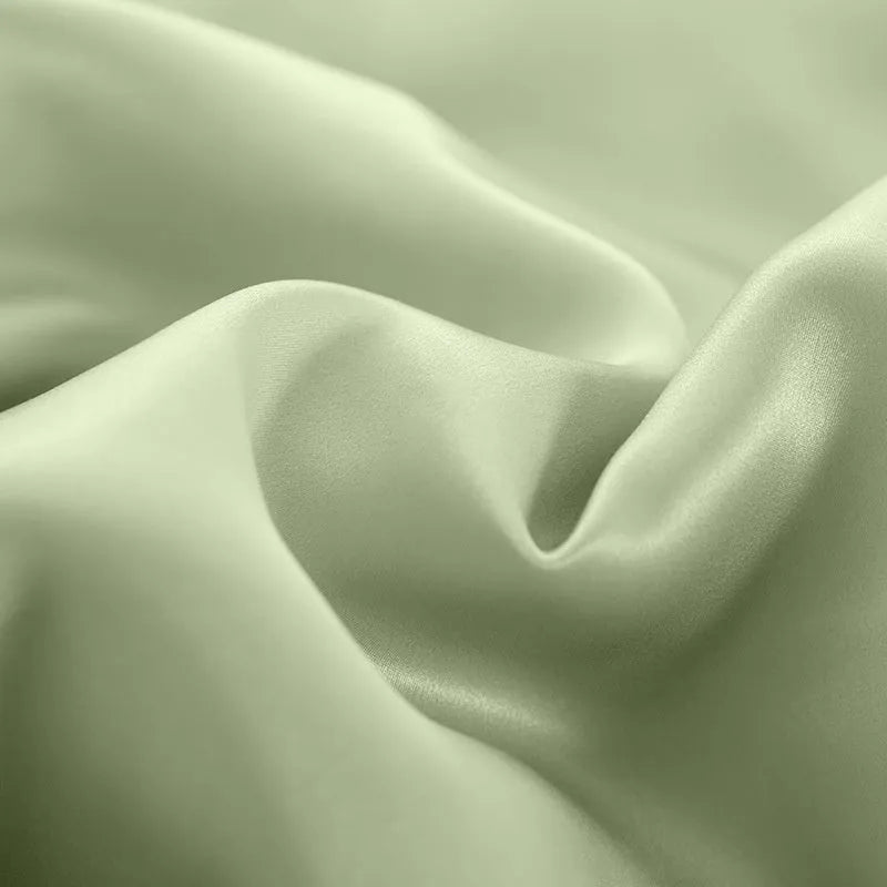 Solid colour silk duvet cover in lotus pink showing plain weave texture and double-sided design.