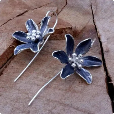 Purple flower-shaped alloy earrings with electroplated finish measuring 3cm in length