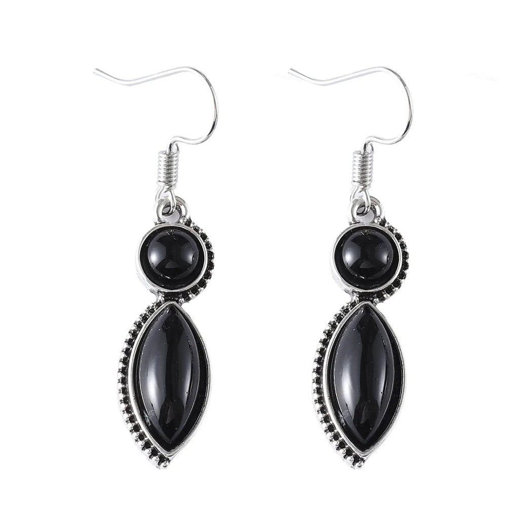 Pair of black and purple geometric vintage pendant earrings with round decorative elements