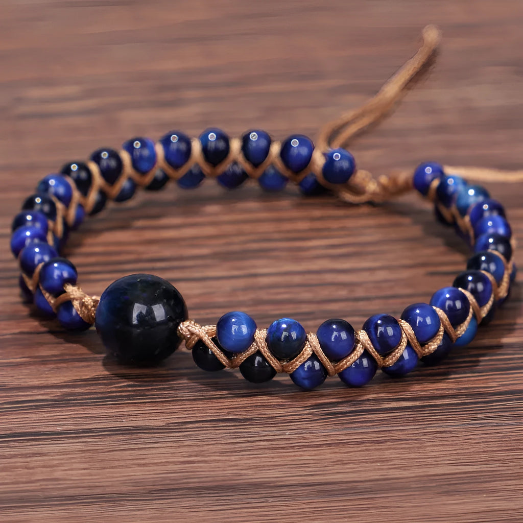 Hand-woven Tigereye gemstone pull bracelet showing geometric pattern and natural stone texture