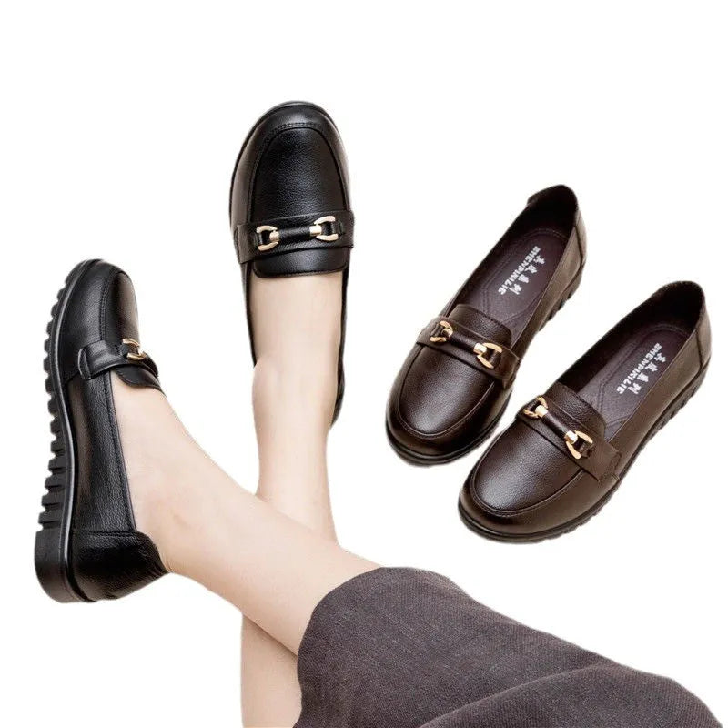 Black women's casual leather pumps with a round toe and low flat heel