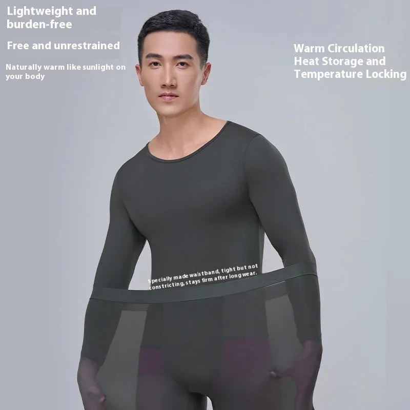 Men's constant temperature heating nylon bottoming suit in black with top and trousers on model