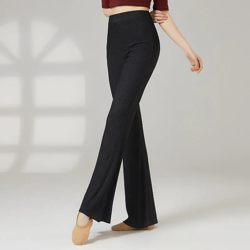 Close-up of solid colour polyester dance practice trousers for women, showing the form-fitting fit.