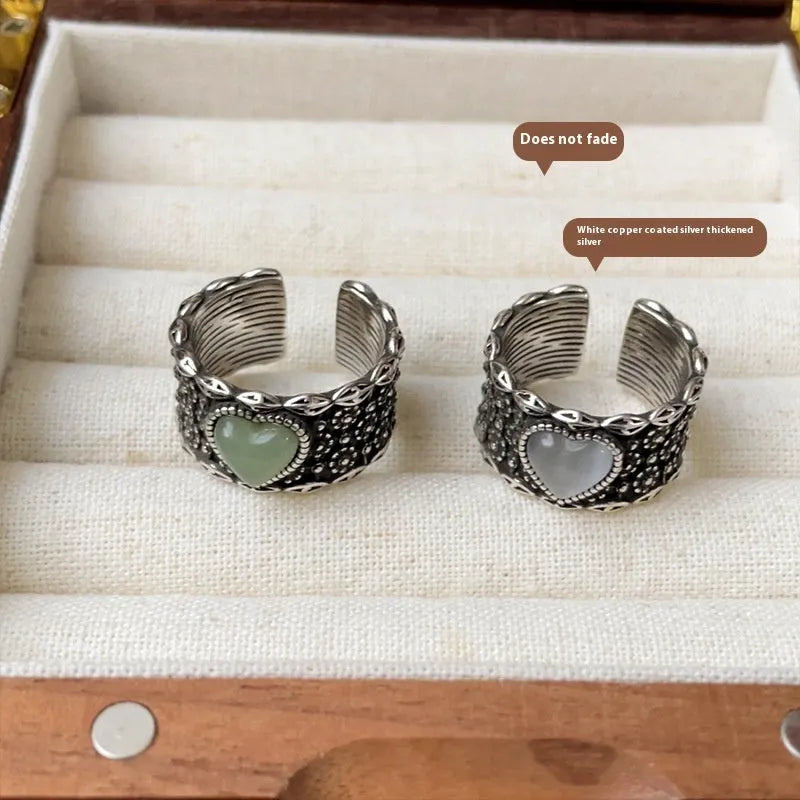 Retro wide-faced heart ring with adjustable opening in white or green colour