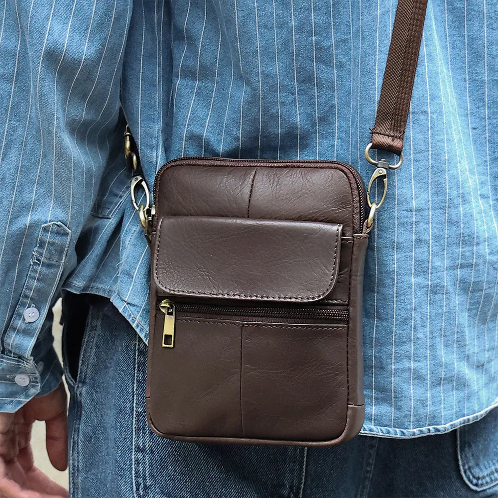 Men's brown genuine leather crossbody shoulder bag with sewing line details.
