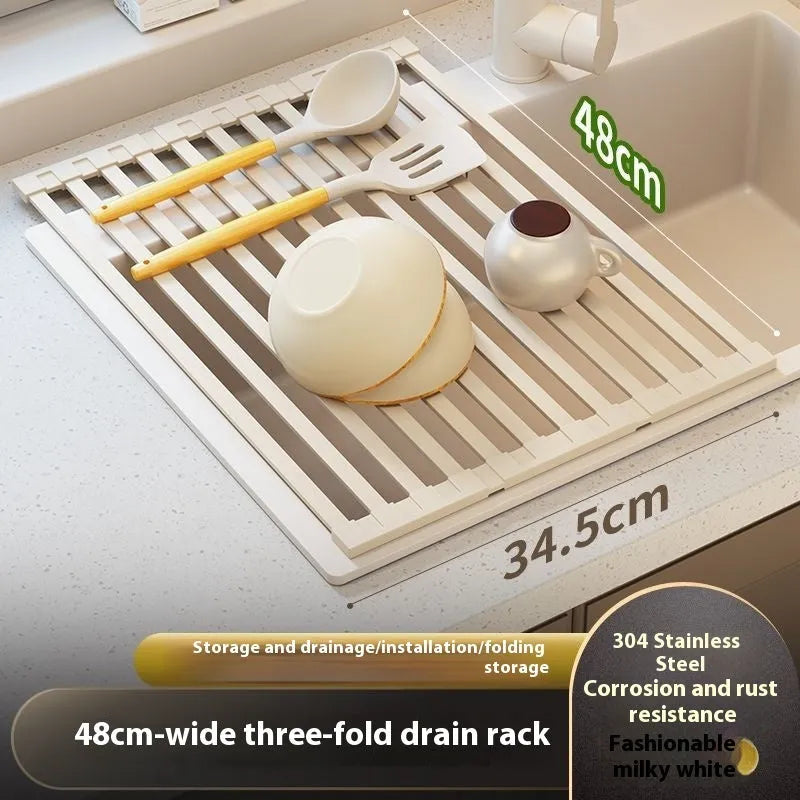 Milky white foldable stainless steel draining rack showing tri-fold design with dishes