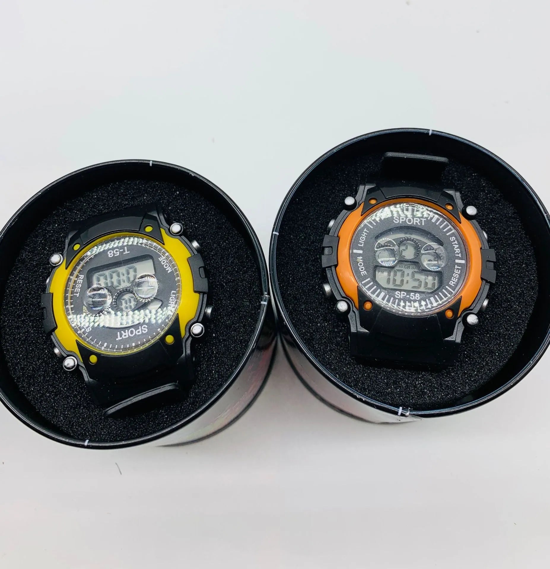 Children's digital sports watch with silicone strap, showing alarm and waterproof features.