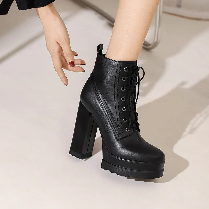 Women's chunky heel waterproof platform boots in black cowhide with side zipper and round toe